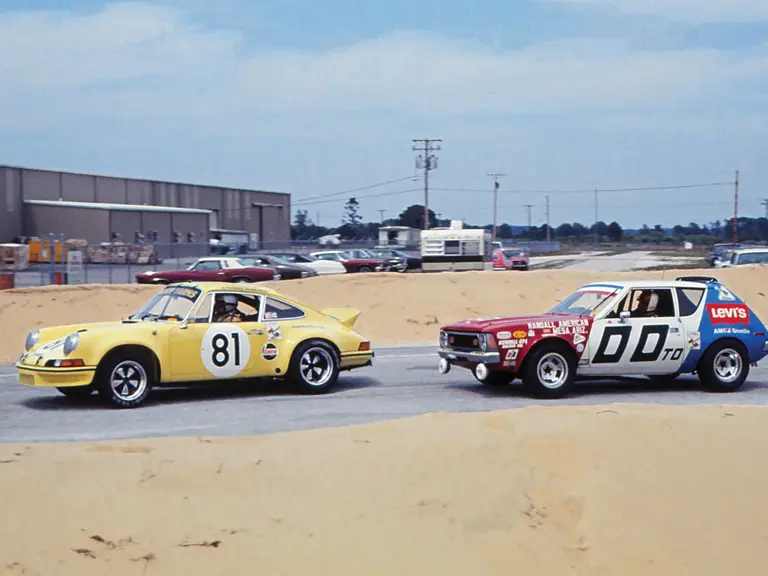 The 2.8 RSR racing past an AMC Gremlin at the 1973 12 Hours of Sebring.