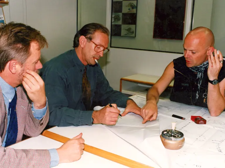 Flatz is pictured meeting Harm Largaay, then lead designer for Porsche, to sketch out his vision for the Physical Sculpture XI.