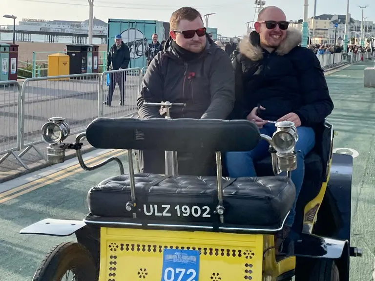 The De Dion-Bouton is pictured participating in the London to Brighton Veteran Car Run.