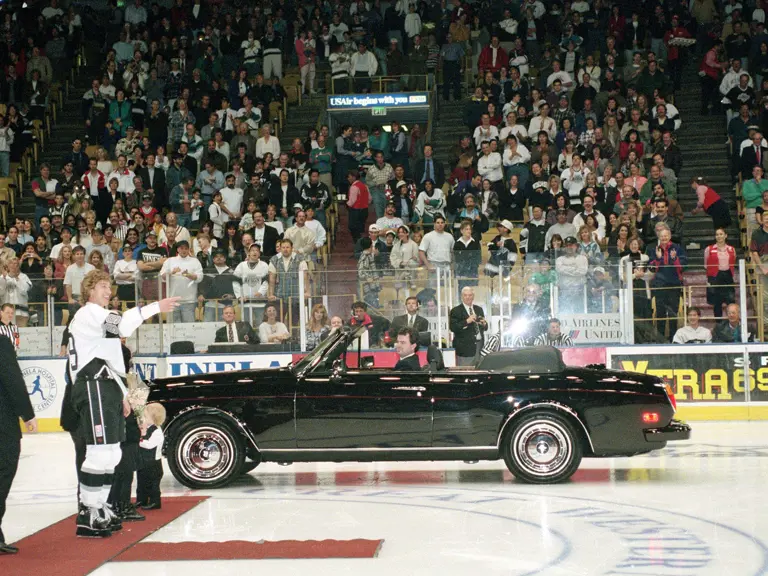 Wayne Gretzky recieving his new Corniche gifted to him by LA Kings owner Bruce McNall during a ceremony honoring him as the NHL's all-time goal scorer.