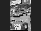 Tony Dean behind the wheel of car no. 14, at the Tourist Trophy Race in Oulton Park, 1966.