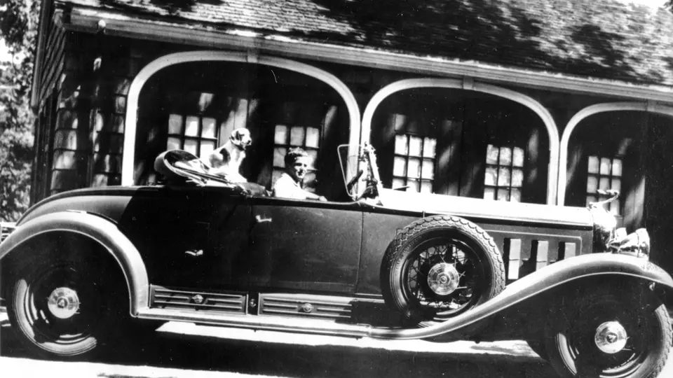 John Moir Jr. with his college car in Cape Cod in 1964.