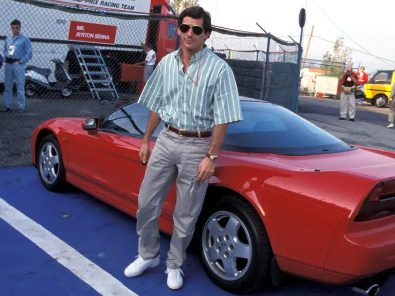 Ayrton Senna arrives at Circuito Estoril for the 1991 Portuguese Grand Prix in his Honda NSX.