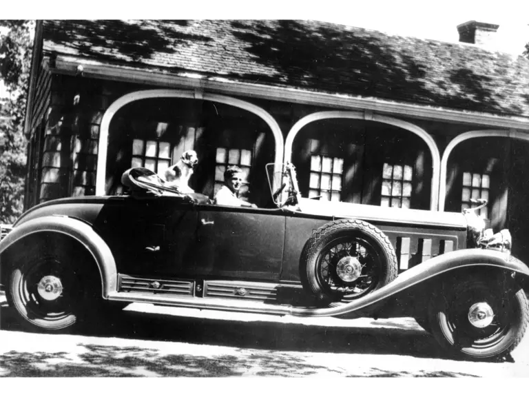 John Moir Jr. with his college car in Cape Cod in 1964.