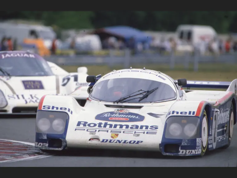 The Porsche leads the Silk Cut Jaguar XJR-6 numbered “51” at the 1986 24 Hours of Le Mans.