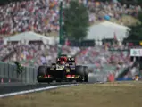 Kimi Räikkönen drives the Lotus at the 2013 Hungarian Grand Prix at the Hungaroring, where the Finn finished in 2nd place.