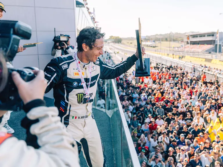 Rossi beams on the 2025 Bathurst 12 Hour podium, having recovered from 12th to finish 2nd.
