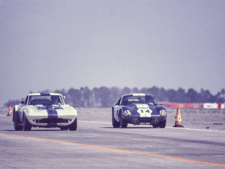 Chassis 003, race #1, driven by Delmo Johnson/Dave Morgan/Ed Sevadjian, leads Shelby American’s Shelby Cobra Daytona, race #14, driven by Bob Johnson and Tom Payne, at the 1965 Sebring 12 Hours.
