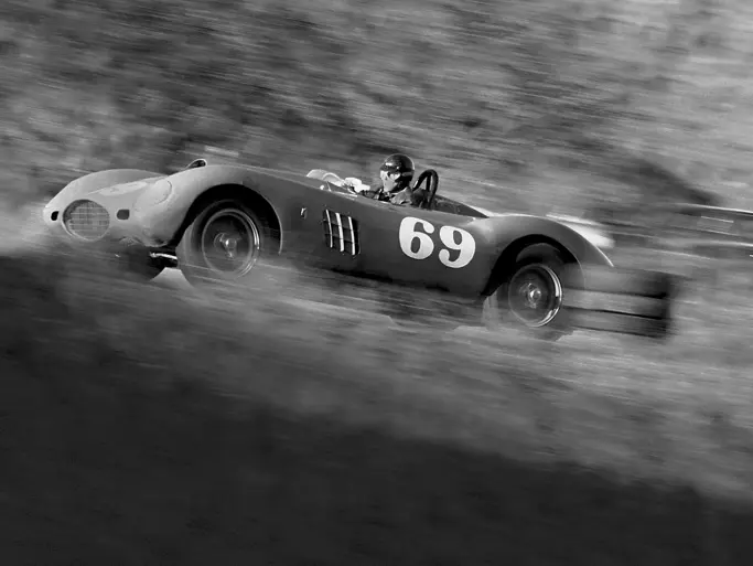 Dan Gurney, behind the wheel of chassis no. 0478 AM, at Paramount Ranch during the main event race. Gurney took 1st overall at the race, held on 8 December 1957.