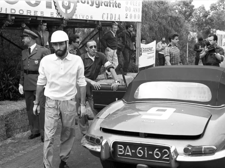 Pinto as shown in the pits next to his E-Type at Montes-Claros in 1963.