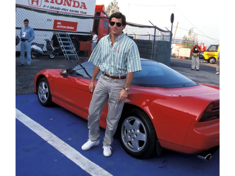 Ayrton Senna arrives at Circuito Estoril for the 1991 Portuguese Grand Prix in his Honda NSX.