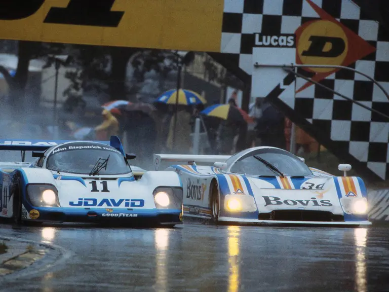 Chassis 956-110 dominates in the rain at the Brands Hatch 1000 KM in 1983.