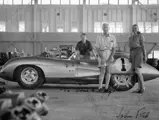 The Chevrolet Corvette SS with driver John Fitch (back) and Zora Arkus-Duntov and his wife Elfi in the garage at Sebring, 1957.