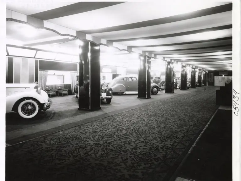 LeBaron Sport Coupe 1106-4, pictured at middle in its original trim at the 1934 New York Auto Show.