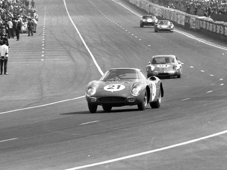 Chassis no. 5893, #21, leads an Alpine, Ferrari, and Shelby at the 1965 24 Hours of Le Mans.