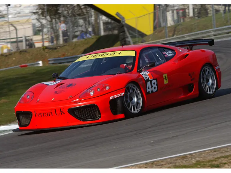 011 M at speed during the first round of the 2002 British GT Championship at Brands Hatch, where it finished fourth overall and third in class.