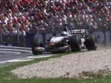 David Coulthard guides the McLaren MP4-16 around the track en route to victory at the Austrian Grand Prix.