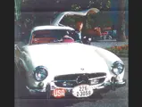 Swiss industrialist Rene Wasserman, the first owner of this extraordinary alloy Gullwing, is pictured here with the car when it was virtually new, appropriately finished in white over red.