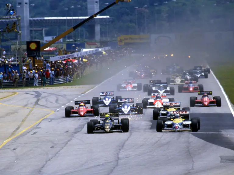 Ayrton Senna leads at the start of the 1986 Brazilian Grand Prix.