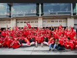 Scuderia Ferrari celebrates Michael Schumacher and Felipe Massa finishing first and third at the 2006 European Grand Prix.