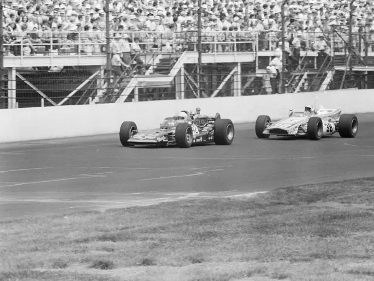 Denny Hulme leads Jim McElreath at the 1969 Indianapolis 500.