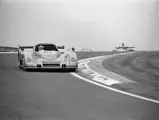 Car number 62, the TOJ SC304 driven by Rolf Stommelen, crests the hill at the 1976 Dijon 500 km.