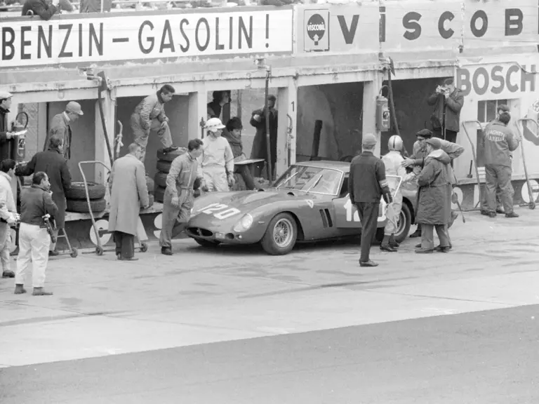 NüRBURGRING, GERMANY - MAY 27: Willy Mairesse / Mike Parkes, SEFAC Ferrari, Ferrari 330 LM/GTO 3673SA in the pit lane during the Nurburgring 1000 kms at Nürburgring on May 27, 1962 in Nürburgring, Germany. (Photo by Rainer Schlegelmilch)