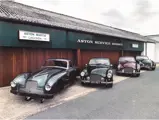 Chassis AM300/3/1554 (far right) is pictured outside Aston Service Dorset.