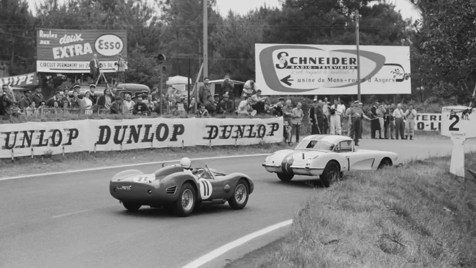 The #1 Corvette is pursued by the eventual 1960 24 Hours of Le Mans race-winning #11 Ferrari TR59 of Oliver Gendebien and Paul Frère.