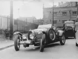 Bugatti enthusiast Francis Muel, who owned the car between 1956 and 1961, threads chassis 37363 down Rue Dantan in Saint-Cloud.