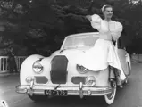 French fashion model and actress Capucine posing on 100238 in the Bois de Boulogne, 26 June 1951.