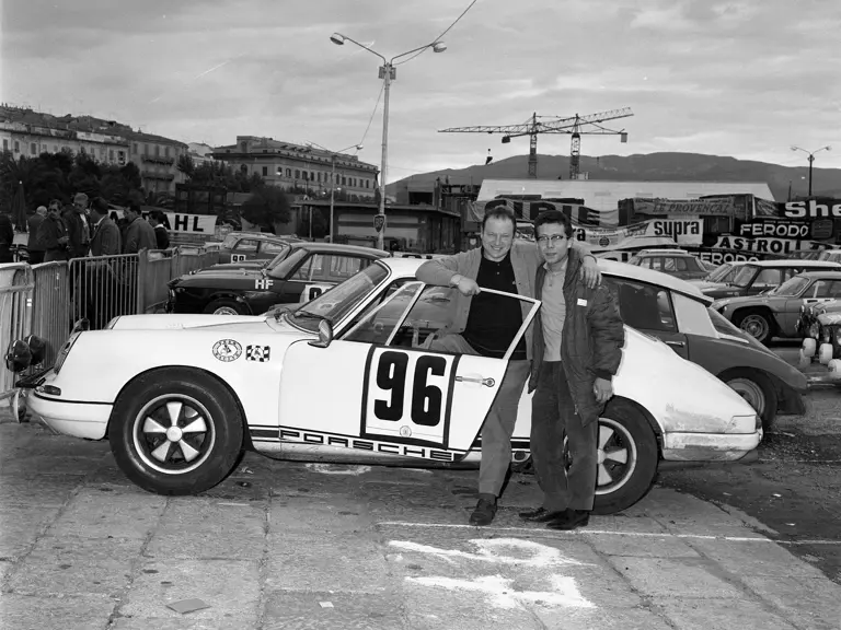 Fernand Schligler poses with co-driver Gérard Couzian and his new 911 R at the 1967 Tour de Corse.