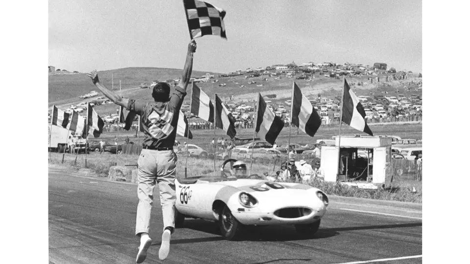 Merle Brennan takes the checkered flag at Laguna Seca, June 9, 1963.