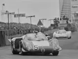 Chassis no. 015, race #5, leads a Porsche 907 into a turn at the 1968 Nürburgring 1000 KM. Chassis no. 015 was driven by Udo Schutz and Lucien Bianchi to a 4th in class and 7th overall finish.