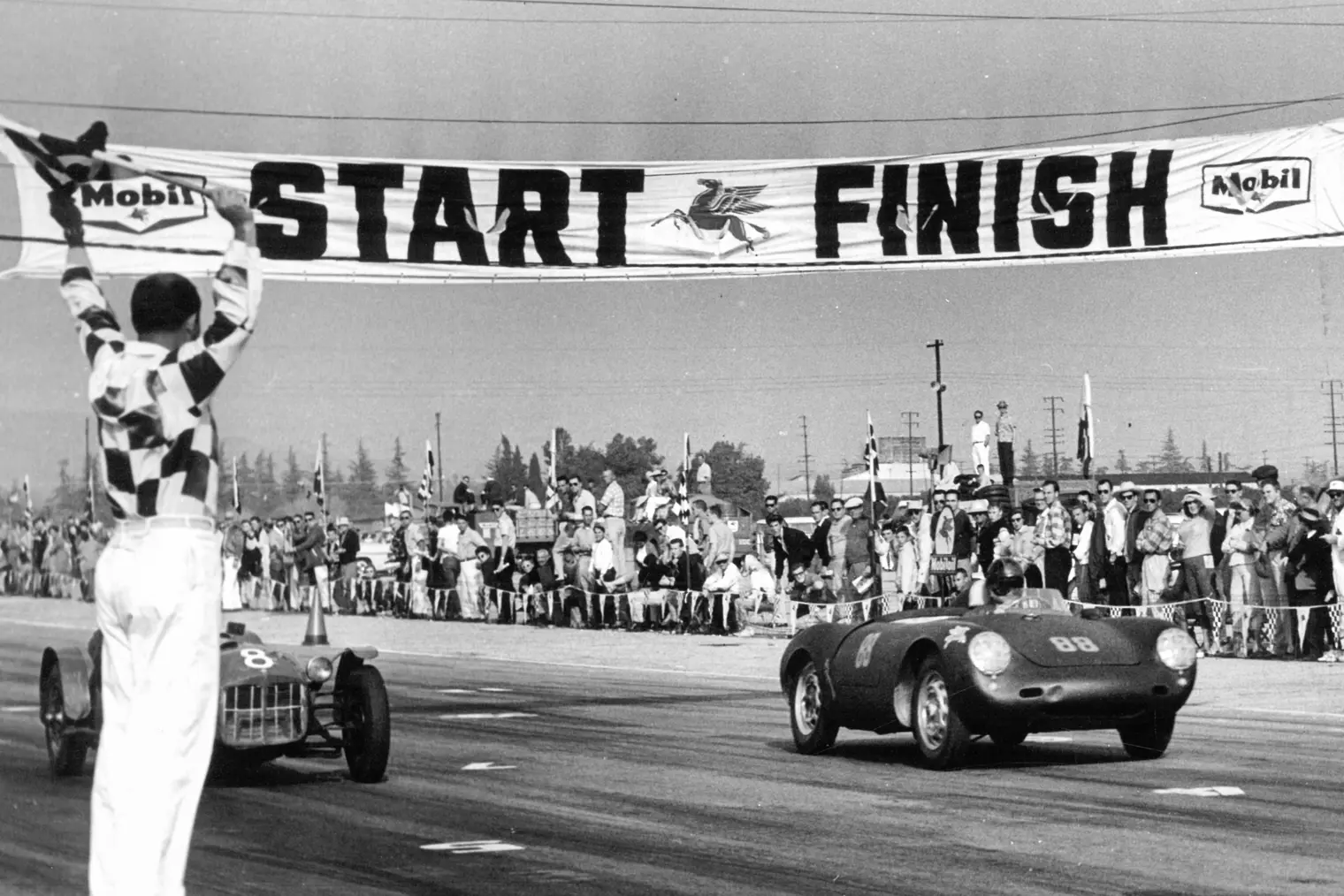 McAfee kicks off the 1958 season by steering chassis 550A-0116 to victory at Pomona.