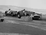 Dan Gurney, behind the wheel of chassis no. 0478 AM (#69), chasses down Carroll Shelby in John Edgar's Ferrari 410 Sport Spider (#98) at Palm Springs on 13 December 1958. Gurney would go on to finish 1st overall in the main event race.
