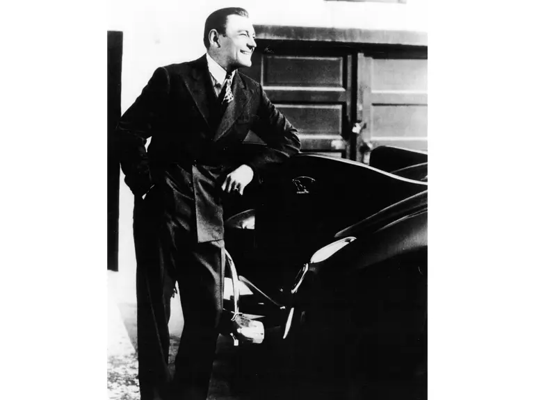 Buck Jones poses with his Speedster at Monogram Studios, 1939.