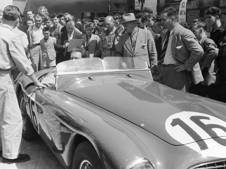 Mechanic, Fernand Seewald, with chassis 0116/A at Le Mans 1952.