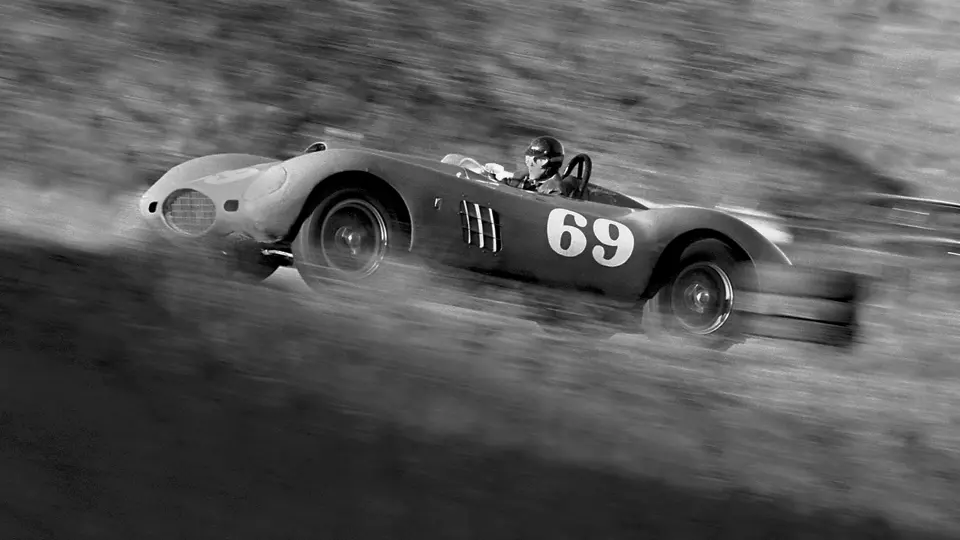 Dan Gurney, behind the wheel of chassis no. 0478 AM, at Paramount Ranch during the main event race. Gurney took 1st overall at the race, held on 8 December 1957. Dan Gurney, behind the wheel of chassis no. 0478 AM, at Paramount Ranch during the main event race. Gurney took 1st overall at the race, held on 8 December 1957.