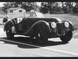 The 328 Roadster wears the race number “31” at a hill climb event. Note the custom-made grille.