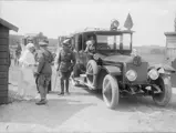 Chassis 64RB is seen in the foreground as Millicent Sutherland-Leveson-Gower, the Duchess of Sutherland, receives King George V, Queen Mary of Teck, and Edward, Prince of Wales, at No. 9 Red Cross Hospital in Calais on 14 July 1917.