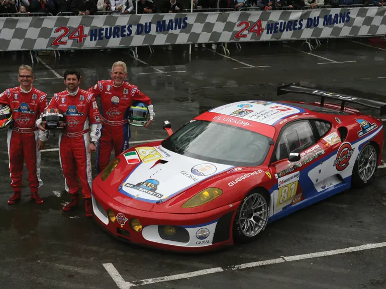 Joe Foster, Don Kitch Jr., and Patrick Dempsey pose with the F430 GT2 during the driver’s parade prior to the 2009 24 Hours of Le Mans.