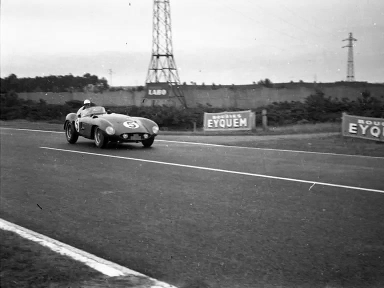 Driver’s eyes lock with camera in the opening stages of the 1955 24 Hours of Le Mans.