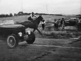 Pete Henderson edges out the undefeated quarter horse at the famous race in La Habra, California, 1944.