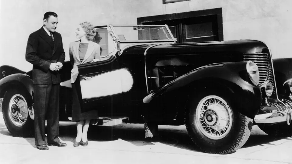 Buck Jones and Helen Twelvetrees pose with 1000459 on the Monogram Studios Lot, 1939.