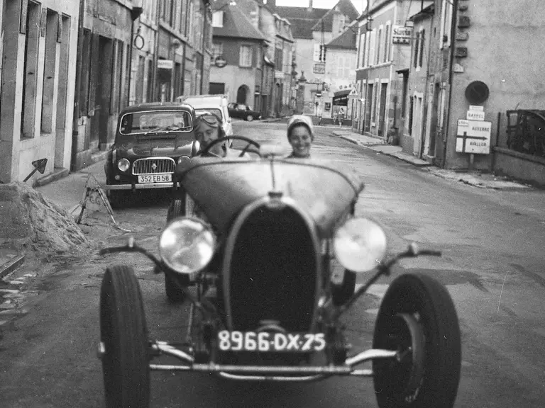 Former owner Philippe Vernholes delivers the Bugatti to Jean-Paul Monceau’s workshop as a rolling chassis.