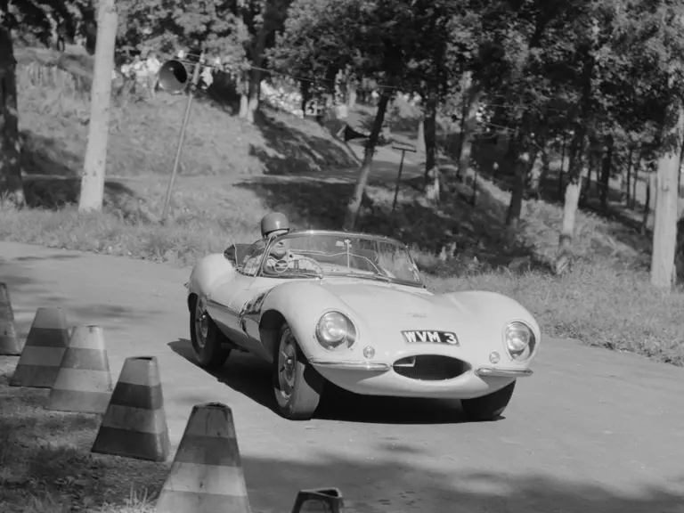 John Browning behind the wheel of his recently acquired XKSS as he flies up the hill in September 1960 at the Prescott Bugatti Owners Club Hill Climb.