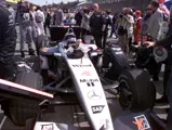 David Coulthard lowers himself into chassis MP4-16A-05 at the 2001 San Marino Grand Prix, where he would finish 2nd.
