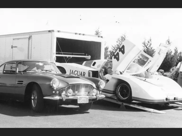 Photographed in 1985, then-owner Mr Will Lobb poses with the Aston Martin DB4 next to the Jaguar XJS-5 of Brian Redman and Hurley Haywood. The duo went on to win the Road Atlanta 500.