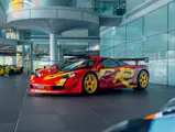 The Pop Art F1 GTR is displayed alongside other exotic supercars.